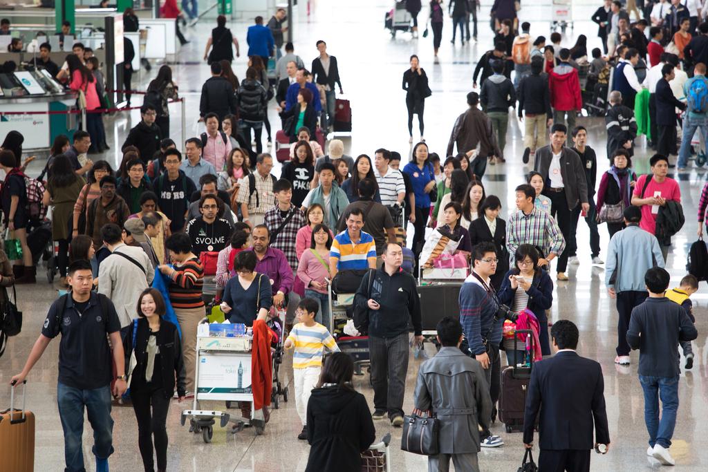 Chinese travelers at an airport